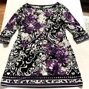 White House Black Market size medium floral patterned tunic.
